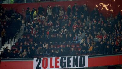 Fans with a banner in reference to Manchester United manager Ole Gunnar Solskjaer at Old Trafford. United supporters have been involved in more football-related arrests where racism was an aggravating factor than any other club in England in the four seasons up to 2017/18, data from the Home Office shows. Reuters