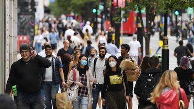 Shoppers walk down Oxford Street in London, Britain, 15 June 2020. EPA