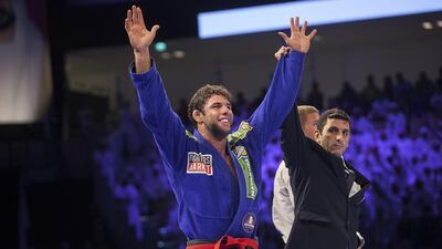 Marcus Vinicius Almeida of Brazil celebrates beating Alexander Trans of Denmark in the open weight black final on Saturday at the Abu Dhabi World Professional Jiu-Jitsu Championship. Mona Al Marzooqi / The National