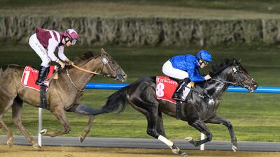Pat Cosgrave aboard Naaeebb races to victory at Meydan Racecourse in Dubai on Thursday night. Christopher Pike / The National
