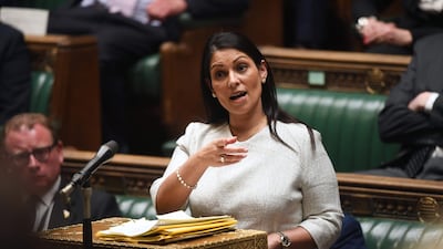 Britain's Home Secretary Priti Patel speaks on the plan to send migrants and asylum seekers who cross the Channel 'illegally' to Rwanda at the House of Commons in London. AFP / UK Parliament