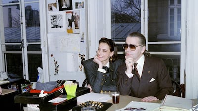 Lagerfeld is seen with model Ines de la Fressange in this photo taken on March 13, 1987. AFP