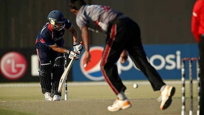 Nepal captain Paras Khadka flicks one away to the leg side. Antonie Robertson / The National