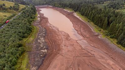 The Cantref Reservoir in Brecon Beacons National Park, Wales, where water levels dropped during the warm summer this year. PA.