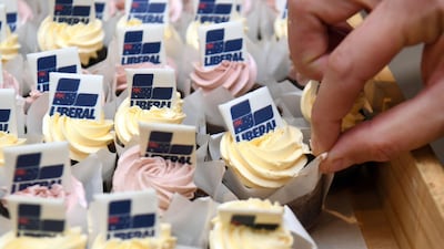 Liberal Party cupcakes are handed out to the party faithful and media before Australia's Prime Minister Scott Morrison address to the Liberal Party's campaign launch in Melbourne. AFP
