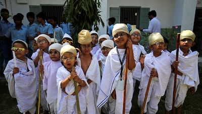 Students dressed as Mahatma Gandhi take part in an event to mark Gandhi's 150th birthday, at a school in Ahmedabad, India. Amit Dave/Reuters