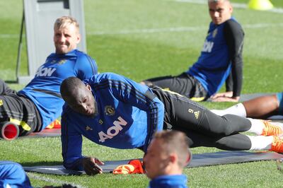 Romelu Lukaku stretches during Manchester United's training session.EPA