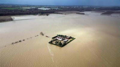 Flooding surrounds a house in the village of Couthures-sur-Garonne, in south-west France. AFP