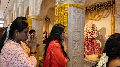 The festival includes days for cleaning the home and replenishing lanterns with oil for five days. Doorways everywhere are made a blaze of colour with flower petals and rice to bring good luck. Antonie Robertson/The National