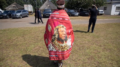 A Zulu woman wears a portrait of the late King Goodwill. AFP