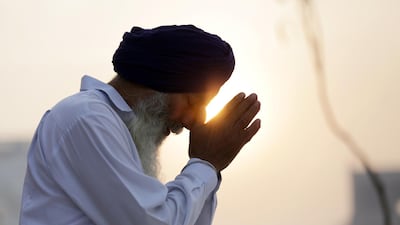 A Sikh devotee prays at the Golden Temple, the holiest of Sikh places on the occasion of the 550th birth anniversary of the first Sikh Guru or master, Sri Guru Nanak Dev Ji in Amritsar, India, 12 November 2019. EPA