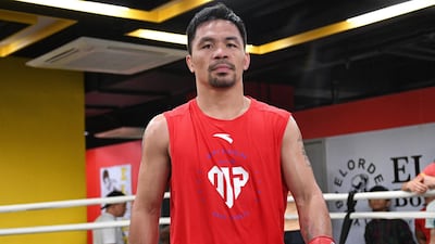Manny Pacquiao is said to be mulling over possible retirement, perhaps even after the July fight. Ted Aljibe / AFP