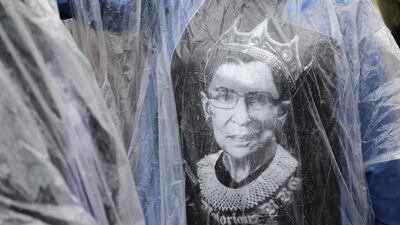 An observer wears a Ruth Bader Ginsburg t-shirt outside the Supreme Court during a session in Washington, DC, USA. Andrew Gombert / EPA