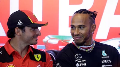 Former F1 driver Johnny Gerbert believes Lewis Hamilton, right, and Carlos Sainz would make a great team at Ferrari. Reuters
