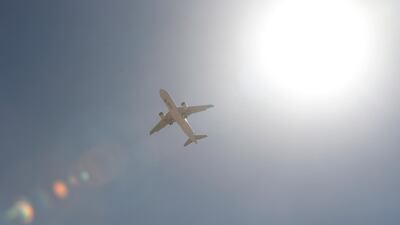 A cargo plane of the World Food Programme (WFP), carrying humanitarian aid prepares to land over Sanaa, November 30. EPA