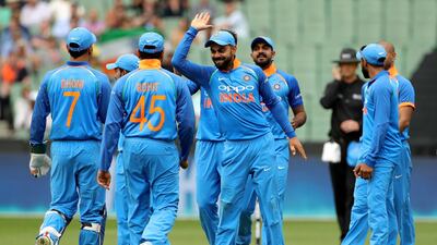 India captain Virat Kohli, centre, has good reason to be a happy man at the moment. Mark Dadswell / Reuters