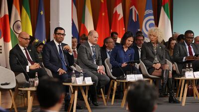 Dr Sultan Al Jaber, President-designate of Cop28, with Simon Stiell, left, executive secretary of the UN Framework Convention on Climate Change, German Chancellor Olaf Scholz, centre, German Foreign Minister Annalena Baerbock, second right, and Jennifer Morgan, Germany’s Special Envoy for International Climate Action, at the Petersberg Climate Dialogue on Wednesday. Getty