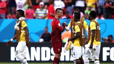 Cristiano Ronaldo of Portugal shakes hands with Ghana players after their match on Thursday at the 2014 World Cup in Brasilia, Brazil. Adam Pretty / Getty Images