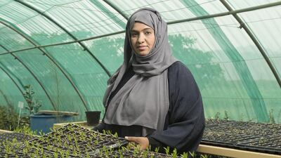 Mariam Al Hamoudi, a plant nursery owner, has been helped by the Fujairah Welfare Association to set up her own business in Al Badiyah. Antonie Robertson / The National
