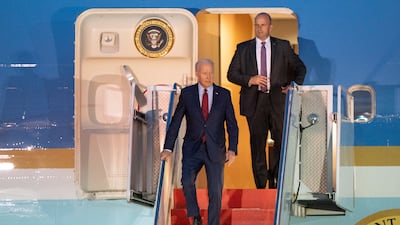 US President Joe Biden leaves Air Force One at Stansted Airport, Essex, on Sunday night. PA