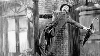 Gene Kelly's Singin' in the Rain is the quintessential dance scene.
