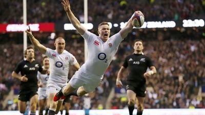 Chris Ashton celebrates his try for England against New Zealand.