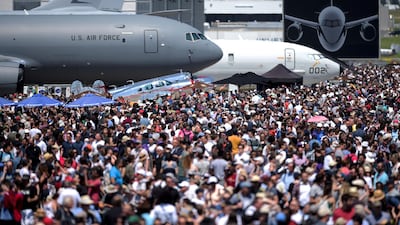 Visitors walk on the tarmac during the 2019 International Paris Air Show at Le Bourget Airport, near Paris. The 2021 edition of Paris Air Show is cancelled, organisers announced on December 7, 2020. AFP.