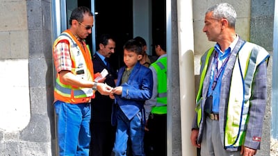 A Yemeni child walks to board a UN aircraft at Sanaa International Airport while being evacuated bound for the Jordanian capital Amman to receive medical treatment there. AFP