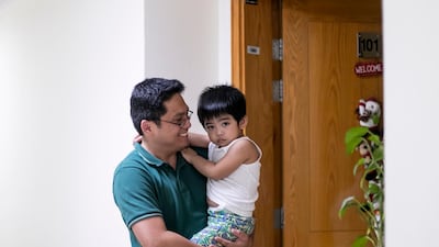 While Earvin Famarin plans to be open about money with his son in the future, he says traditionally Filipinos are not comfortable discussing financial matters. Reem Mohammed/The National