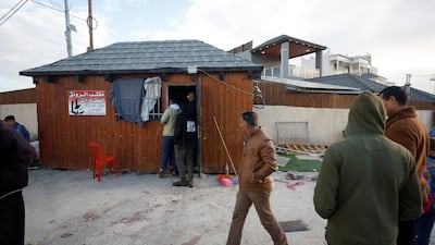 Palestinians gather at the scene of a shootout between Israeli forces and gunmen during a raid at the Aqabat Jabr refugee camp near Jericho in the Israeli-occupied West Bank. Reuters