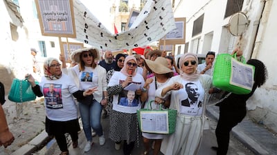 Families of Tunisian political detainees demand their release at a protest on the 67th anniversary of Republic Day, in Tunis. EPA