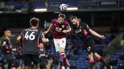 Burnley's Chris Wood in action with Liverpool's Nathaniel Phillips. Reuters