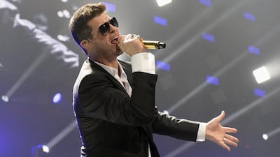 Robin Thicke performs during KIIS FM’s Jingle Ball concert at the Staples Center in Los Angeles, California on December 6, 2013. Kevork Djansezian / Reuters
