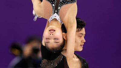Ryom Tae Ok and Kim Ju Sik of North Korea in the Pair Skating free skating competition final. Damir Sagolj / Reuters