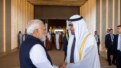 Sheikh Mohamed bids farewell to the Indian Prime Minister after the reception at the Presidential Airport. Ryan Carter / Presidential Court