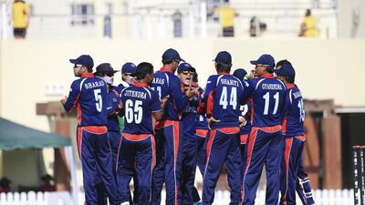 The Nepal cricket side had the support of a couple of hundred expatriates cheering them at the ICC Academy in Dubai on Saturday. Sarah Dea / The National