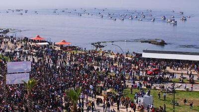A government sponsored pro-Assad rally in the Alawite coastal city of Jableh March 6 ,2014. Sana handout via Reuters.