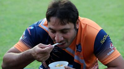 Players break their fast before the Sharjah Ramadan Cup game between MGM Cricket Club and Pacific Group