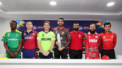 Left to right at T20 World Cup Qualifier captains' press conference on Sunday: Ademola Onikoyi of Nigeria, Jersey's Charlie Perchard, Gary Wilson of Ireland, UAE's Ahmed Raza, Navneet Dhaliwal of Canada, Oman's Zeeshan Maqsood, and Aizaz Khan of Hong Kong. Chris Whiteoak / The National