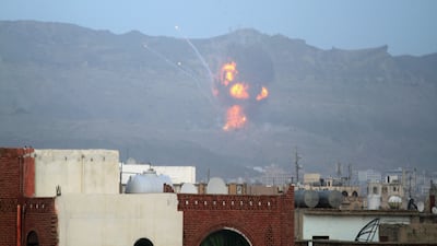 An explosion is seen at the Noqum Mountain after it was hit by an air strike in Yemen's capital Sanaa May 19, 2015. (REUTERS/Mohamed al-Sayaghi)