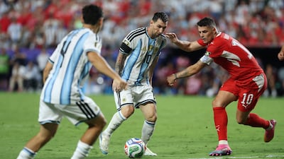 Messi controls the ball against Switzerland's Granit Xhaka during the quarter-final match between Argentina and Switzerland in Kansas City. AFP
