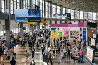 Travellers may encounter longer queues, delays or missed flight connections at airports in the US. AFP