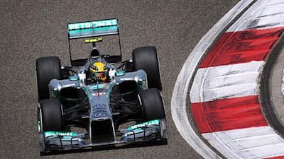 Lewis Hamilton was silver arrow quick in his Mercedes to grab the pole for Sunday's Chinese Grand Prix at Shanghai.