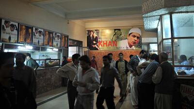 Pakistani moviegoers arrive at a cinema to watch the 2010 Bollywood film My Name is Khan in Karachi. A decades-old ban on Indian films screening in Pakistan was lifted in 2006. Rizwan Tabassum / AFP