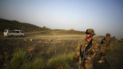 Members of the 1st Platoon Comanche Company of the US Army stand at a checkpoint in the Combat Outpost Lakon in Buwri Tana District, Khost Province in 2021. AFP