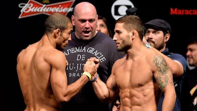 Jose Aldo, left, beat Chad Mendes, right, to retain his UFC featherweight title on Saturday night at UFC 179. Buda Mendes / Getty Images / October 24, 2014