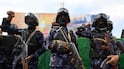 Houthi troops stand guard during a protest against Saudi Arabia, in Sanaa, Yemen. EPA