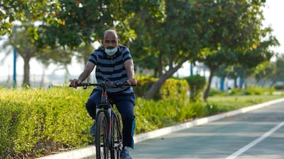 A cyclist at Abu Dhabi Corniche. Victor Besa / The National