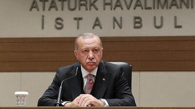 Turkey's President Recep Tayyip Erdogan talks to members of the media regarding the local elections in Istanbul on Monday. AP