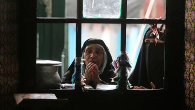 Kashmiri Muslim women pray at a mosque in Srinagar. Farooq Khan / EPA